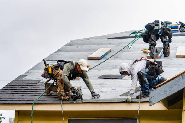 Professional Gutter Installation technician working in Bennett, IA